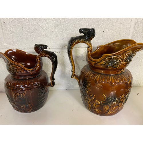 779 - Collection of 7 x water jugs, mainly Arthur Wood