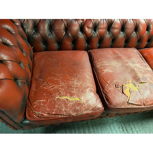 871 - Oxblood red chesterfield 3 seater measuring 198 cms wide