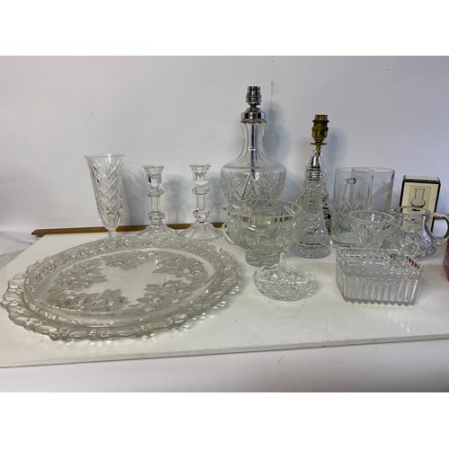 616 - Collection of crystalware including lamps, vases, candlesticks and others.