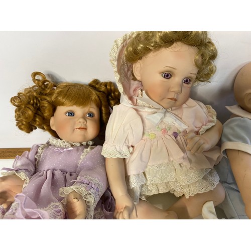 630 - Collection of porcelain dolls including Alberon, Kathy Hippensteel, Titus Tomescu and others.