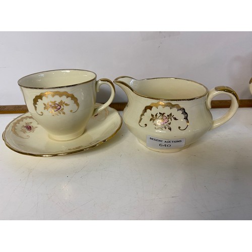 640 - 58 piece Alfred Meakin dinnerware in cream and gold.