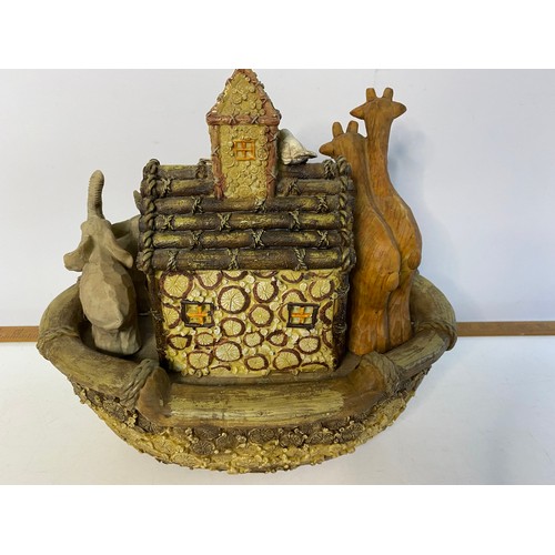 645 - Vintage resin figure of Noah's Ark measuring 29 cm tall.