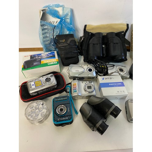 661 - Selection of cameras and accessories to include Pentax Espio 7389, Canon Eos 1000F and 2 pair of bin... 