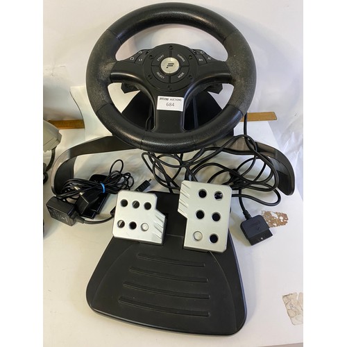 684 - Original PS2 console with controllers, racing wheel, Namco light gun and 10 games. Tested and workin... 