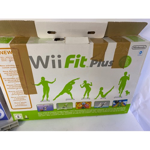 685 - Nintendo Wii console with controllers, nunchucks, sports pack, fit board, rock band drums and 16 gam... 