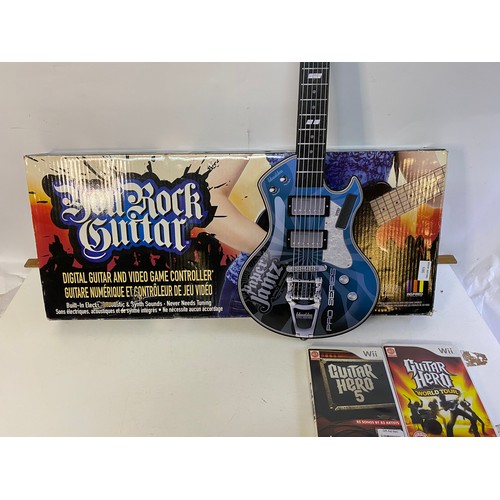 686 - 5 various gaming guitars for different consoles and guitar hero games.