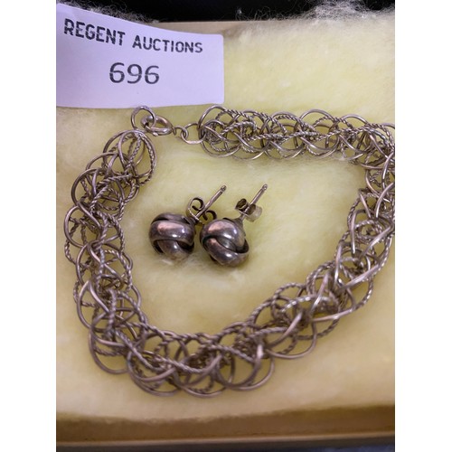 696 - Sterling silver wide link bracelet for charms and pair of silver ear rings.