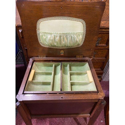 723 - 1930's Morco oak sewing box table.