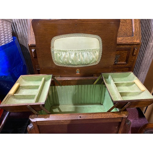 723 - 1930's Morco oak sewing box table.