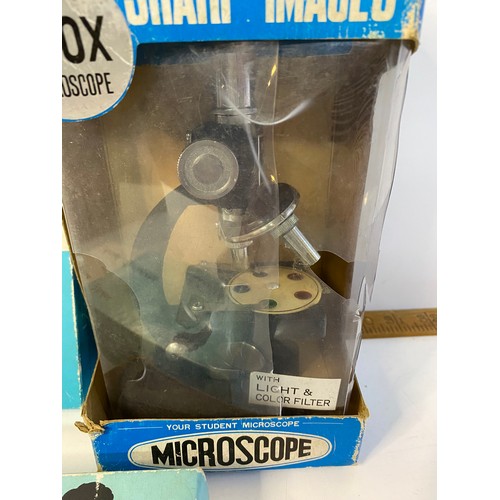 731 - Vintage student microscope with slides and specimens.