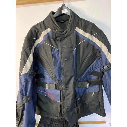 758 - Selection of Motorcycle gear including Harley Davidson jacket, riding boots, trousers and more.