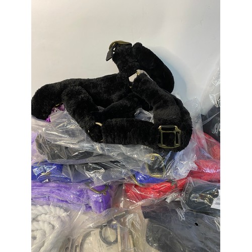 763 - Selection of new Equestrian goods including Headcollars, Fetlock Boots, a Saddle and other items.