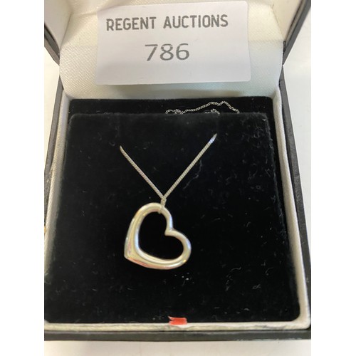 786 - 9ct white gold heart necklace.