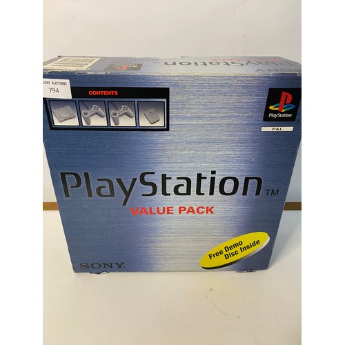 794 - Boxed PS1 console with 2 controllers, leads and memory card. Fully tested and working.