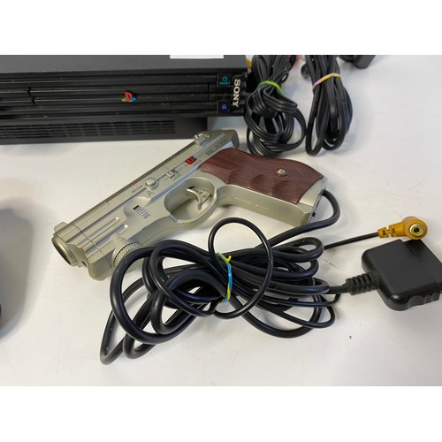 795 - PS2 console with controller, leads, 2 memory cards and a Blaze Scorpion II light gun. Fully tested a... 