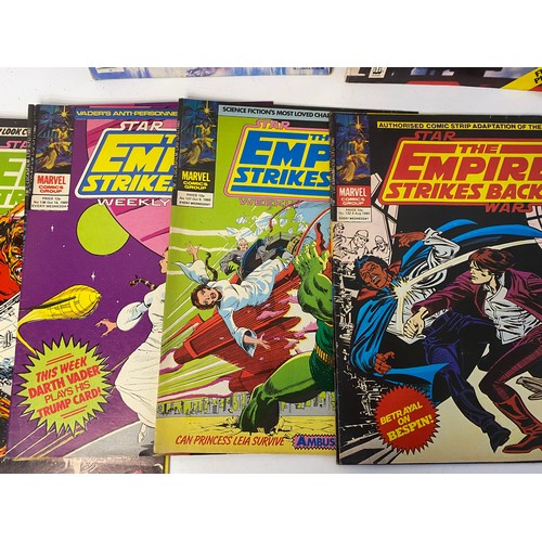 826 - 21 x 1980 'Empire Strikes Back' weekly comics by Marvel. Also, 2 x official posters monthly, sticker... 