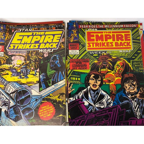 826 - 21 x 1980 'Empire Strikes Back' weekly comics by Marvel. Also, 2 x official posters monthly, sticker... 