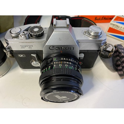 842 - Vintage Canon FT QL camera in bag with accessories including zoom slide duplicator, lens, mount and ... 