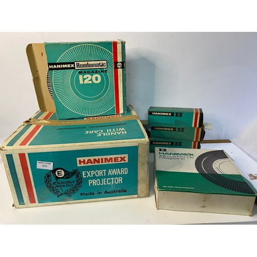 859 - A boxed Hanimex La Ronde Super Auto 35mm projector with selection of Hanimex slide magazines, fully ... 