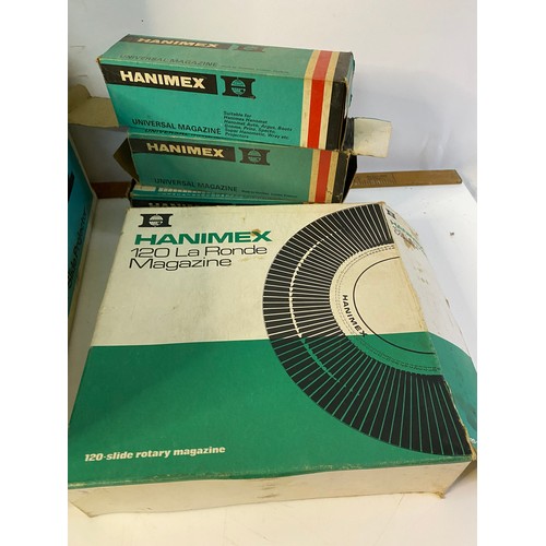 859 - A boxed Hanimex La Ronde Super Auto 35mm projector with selection of Hanimex slide magazines, fully ... 