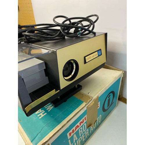 859 - A boxed Hanimex La Ronde Super Auto 35mm projector with selection of Hanimex slide magazines, fully ... 