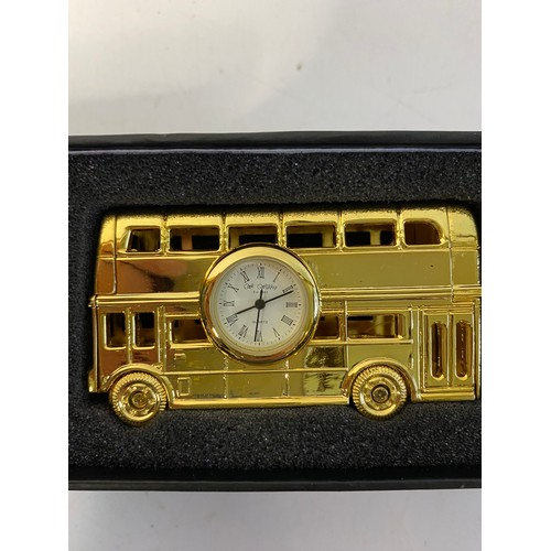 871 - W Widdop quartz miniature clock bus and jeep in gold