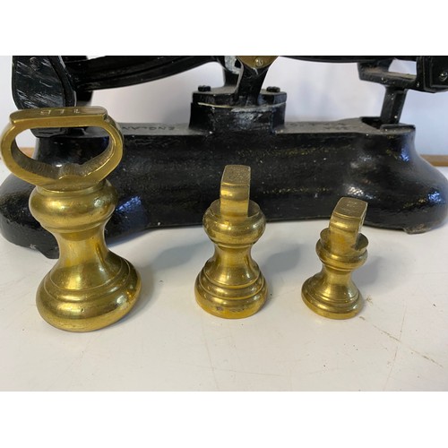 873 - Set of metal scales by Libra Scale and Co complete with set of brass weights