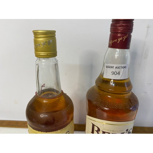 904 - 2 x bottles of Bells whisky, a Bells extra special 75cl bottle and a 1l aged 8 years bottle