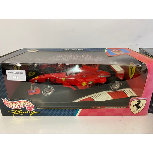 906 - 2 x Hot Wheels models, a Ferrari F2001 Michael Schumacher model 50202 and a 1999 Ferrari F399