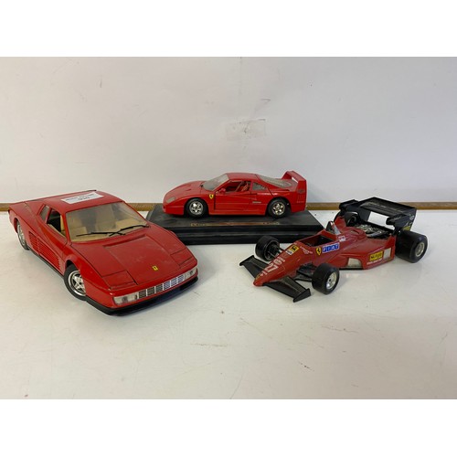 910 - 3 x Burago die cast models including a Ferrari Testarossa 1984 1/18 scale, a Ferrari 126 C4 1/24 sca... 