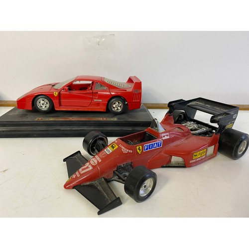 910 - 3 x Burago die cast models including a Ferrari Testarossa 1984 1/18 scale, a Ferrari 126 C4 1/24 sca... 