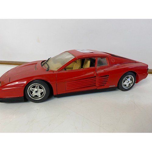 910 - 3 x Burago die cast models including a Ferrari Testarossa 1984 1/18 scale, a Ferrari 126 C4 1/24 sca... 