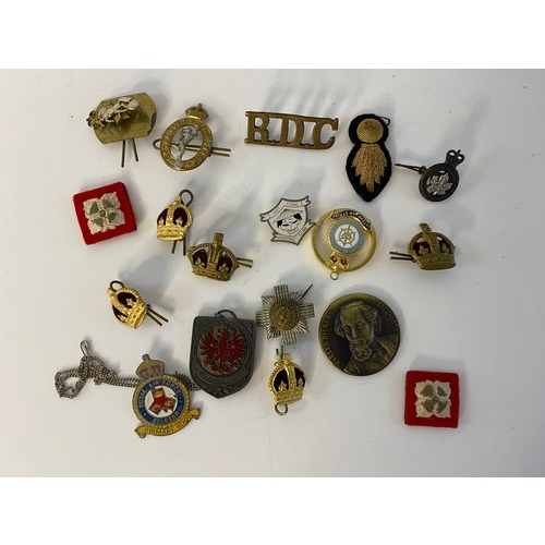 508 - Collection of Military cap badges, pins and patches.