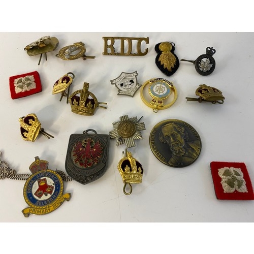 508 - Collection of Military cap badges, pins and patches.