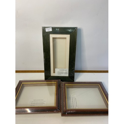 958 - Ten sealed unused picture frames of different designs and sizes.