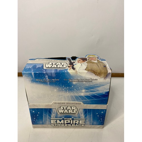 806 - Star Wars The Empire Strikes back TCG. Box of 15 packets each containing 7 common cards, 3 uncommon ... 