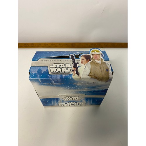 806 - Star Wars The Empire Strikes back TCG. Box of 15 packets each containing 7 common cards, 3 uncommon ... 