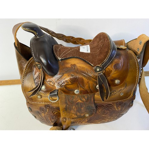 914 - Leather handbag with saddle design and plaited leather strap, made in Mexico