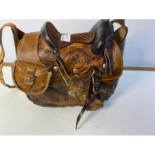 914 - Leather handbag with saddle design and plaited leather strap, made in Mexico