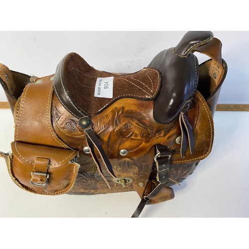 914 - Leather handbag with saddle design and plaited leather strap, made in Mexico