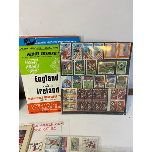 920 - Selection of Football/England memorabilia including stamps, programmes and coins.