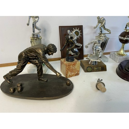 923 - Selection of bowling trophies, also a bowling bottle stopper.