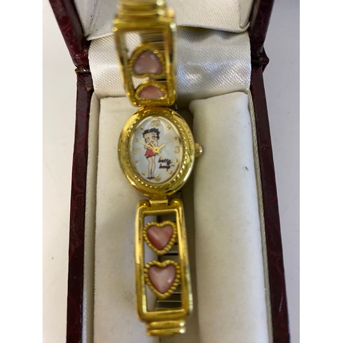 934 - Vintage Betty Boop gold tone bracelet and canvas wall art picture.