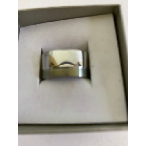 937 - 2 Gents steel and titanium rings from Storm, size N & M