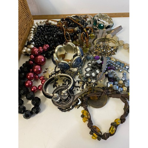 943 - Selection of costume bracelets, bangles and necklaces.