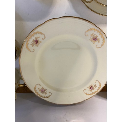 640 - 58 piece Alfred Meakin dinnerware in cream and gold.