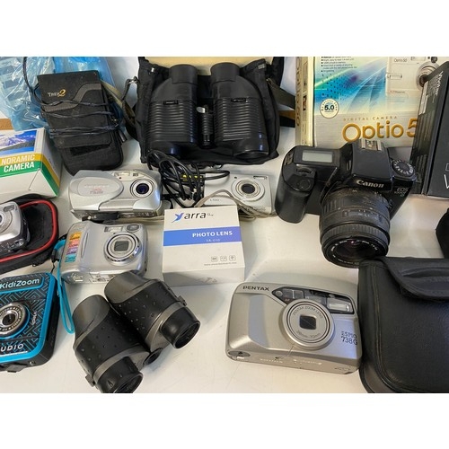 661 - Selection of cameras and accessories to include Pentax Espio 7389, Canon Eos 1000F and 2 pair of bin... 