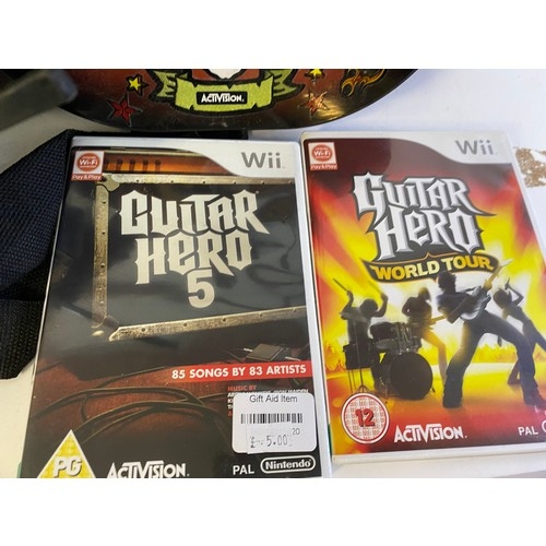 686 - 5 various gaming guitars for different consoles and guitar hero games.