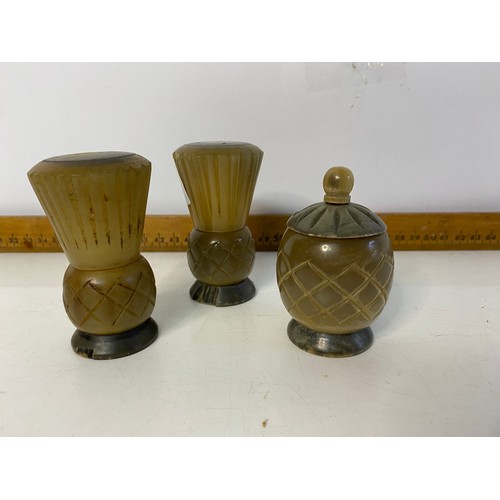 533 - Celtic Thistle cruet set made from horn, measuring 7 cm tall.