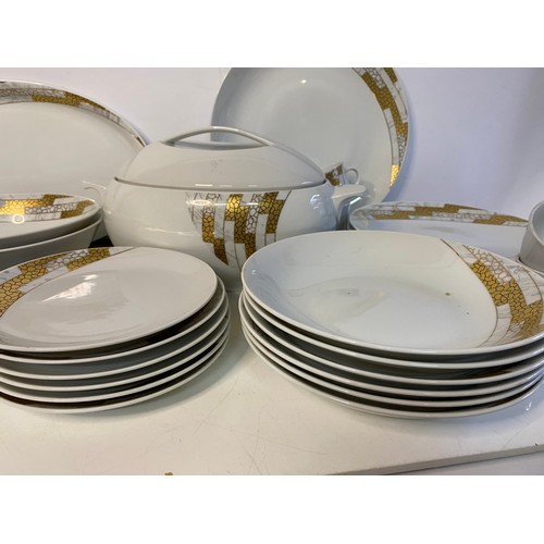 697 - 33 piece Tun Czech white and gold dinner set.